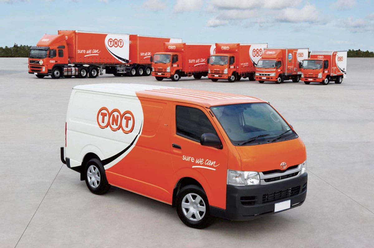 Доставка але. TNT Express. TNT транспортная компания. ТНТ экспресс Уорлдуайд. TNT логистическая компания.