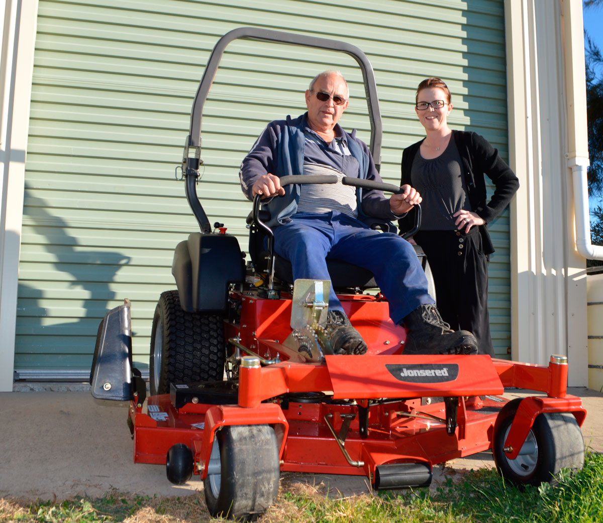 big red mower ready to mow – twin town times